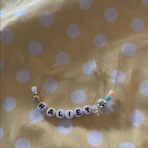 White and Silver Beaded Jewelry Accessory